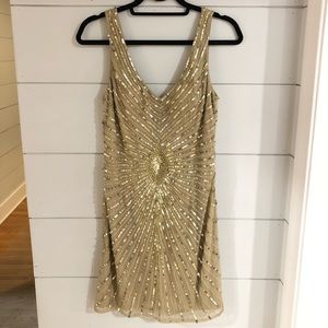Aiden, 8, gold cocktail dress